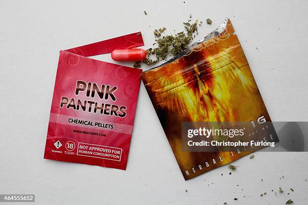 Packets containing 'Legal Highs' are displayed on a table on February 26, 2015 in Manchester, England. There has been a significant rise in the use...