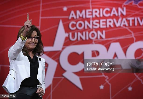 Former Alaska Governor Sarah Palin acknowledges the crowd after she addressed the 42nd annual Conservative Political Action Conference February 26,...