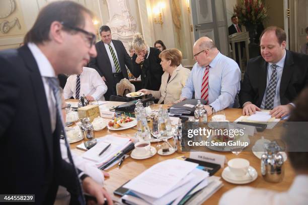 Members of the German government cabinet, including Chancellor Angela Merkel , Vice Chancellor and Economy and Energy Minister Sigmar Gabriel ,...