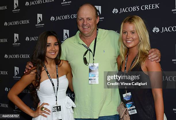 Tahan Lew-Fatt, Bill Brownless and daughter Lucy pose for photo at the Jacob's Creek Harvest House during day 11 of the 2014 Australian Open at...