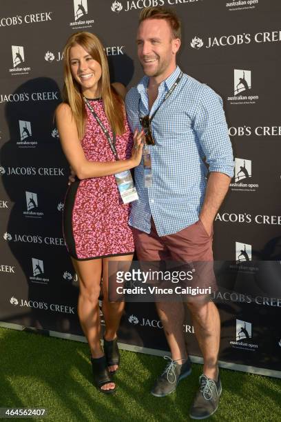 Lauren Phillips and Lachlan Spark pose for photo at the Jacob's Creek Harvest House during day 11 of the 2014 Australian Open at Melbourne Park on...