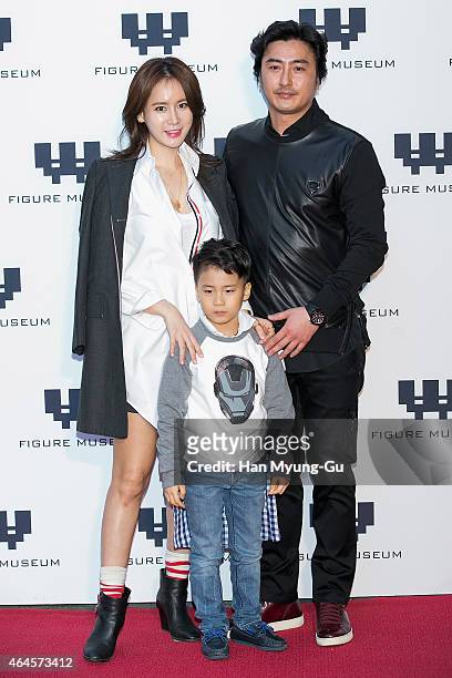 Miss Korea Re Hye-Won and Ahn Jung-Hwan attends the photo call for the opening of "Figure Museum W" on February 26, 2015 in Seoul, South Korea.