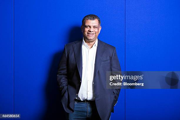 Tony Fernandes, chief executive officer of AirAsia Bhd., poses for a photograph in Kuala Lumpur, Malaysia, on Friday, Feb. 27, 2015. AirAsia has good...