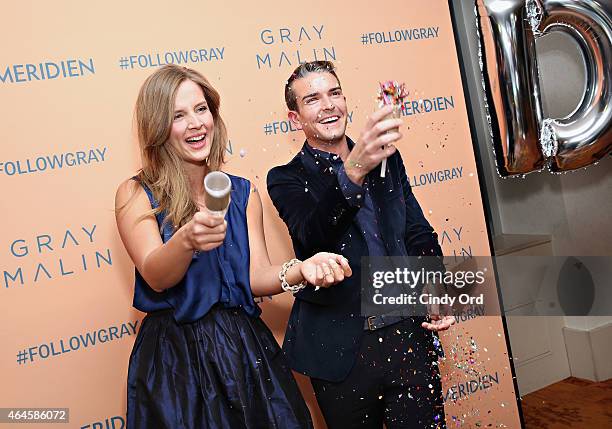 Alex Merrell and artist Gray Malin attend as Le Meridien & Gray Malin present Follow Me at Le Parker Meridien New York on February 26, 2015 in New...