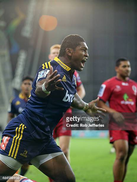 Waisake Naholo of the Highlanders celebrates his try during the round three Super Rugby match between the Highlanders and the Reds at Forsyth Barr...
