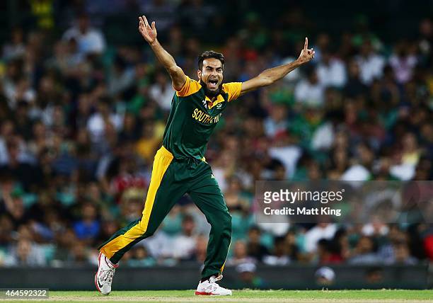 Imran Tahir of South Africa celebrates taking the wicket of Darren Sammy of West Indies during the 2015 ICC Cricket World Cup match between South...