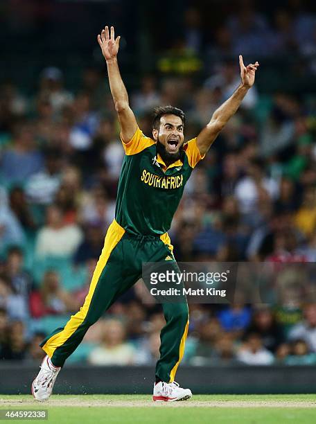 Imran Tahir of South Africa celebrates taking the wicket of Darren Sammy of West Indies during the 2015 ICC Cricket World Cup match between South...