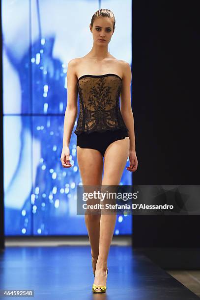 Model walks the runway at the la Perla presentation during the Milan Fashion Week Autumn/Winter 2015 on February 26, 2015 in Milan, Italy.