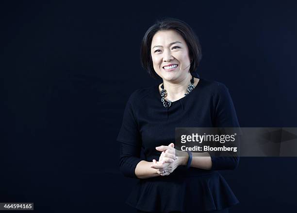 Zhang Xin, billionaire and chief executive officer of Soho China Ltd., poses for a photograph following a Bloomberg Television interview on day two...