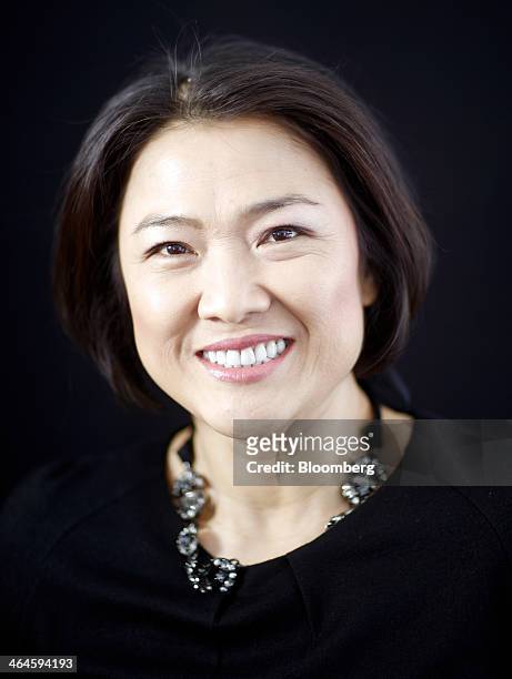 Zhang Xin, billionaire and chief executive officer of Soho China Ltd., poses for a photograph following a Bloomberg Television interview on day two...