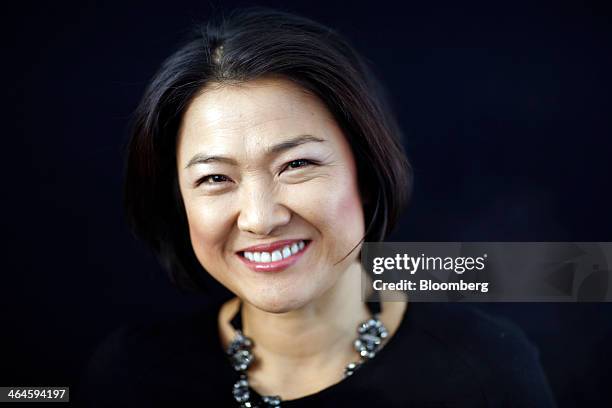 Zhang Xin, billionaire and chief executive officer of Soho China Ltd., poses for a photograph following a Bloomberg Television interview on day two...