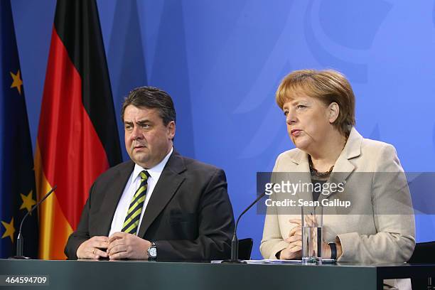 German Chancellor Angela Merkel and Vice Chancellor and Economy and Energy Minister Sigmar Gabriel speak to journalists following two days of...