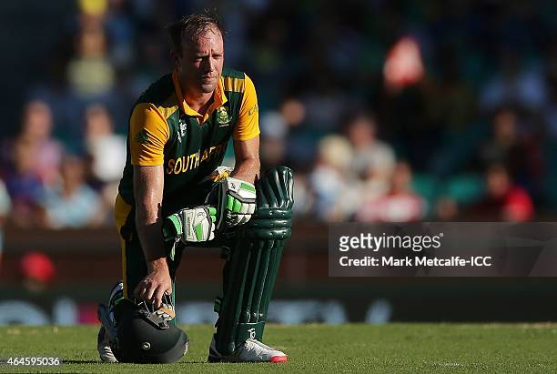 De Villiers of South Africa rests during a drinks break during the 2015 ICC Cricket World Cup match between South Africa and the West Indies at...