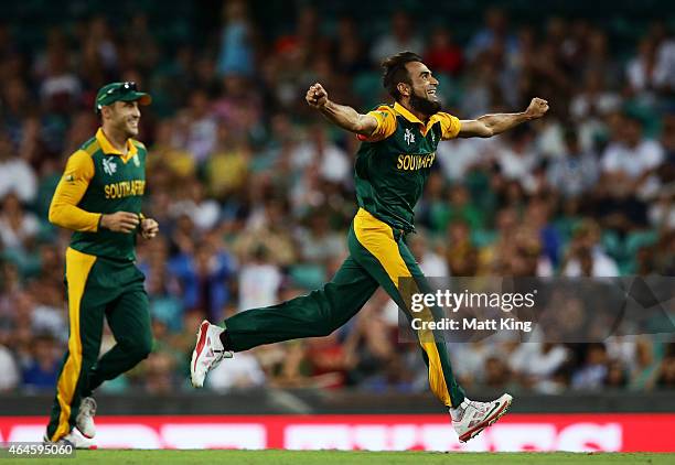 Imran Tahir of South Africa celebrates taking the wicket of Andre Russell of West Indies during the 2015 ICC Cricket World Cup match between South...