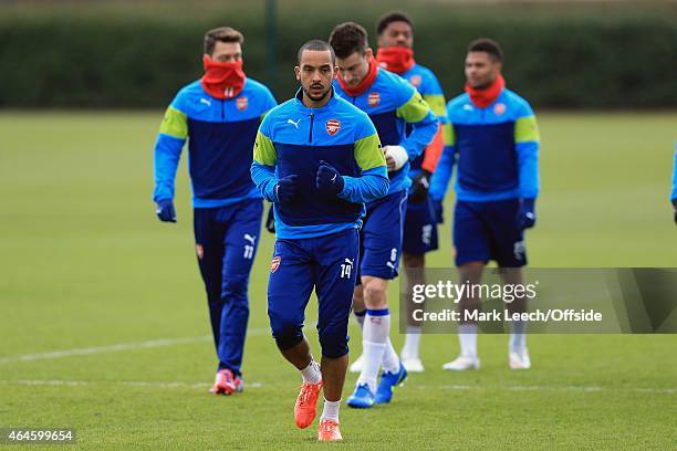 Theo Walcott of Arsenal during the Arsenal training session ahead of the UEFA Champions League round of 16 match against AS Monaco at London Colney...