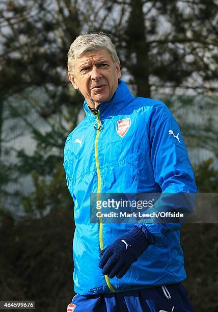 Arsene Wenger, Manager of Arsenal during the Arsenal training session ahead of the UEFA Champions League round of 16 match against AS Monaco at...