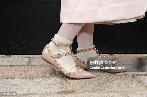 Carrie Kwok stylist and make up artist from Hong Kong wearing Valentino dusky pink shoes with straps and faceted stud details, ankle socks and shower...