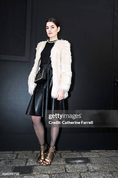 Kelly Horrigan model and journalist from Dublin covering LFW for Xpose magazine: wearing a Zara jacket , two piece top and skirt by H & M, her...