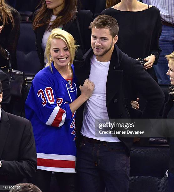 Margot Robbie and Tom Ackerley attend the Arizona Coyotes vs New York Rangers game at Madison Square Garden on February 26, 2015 in New York City.