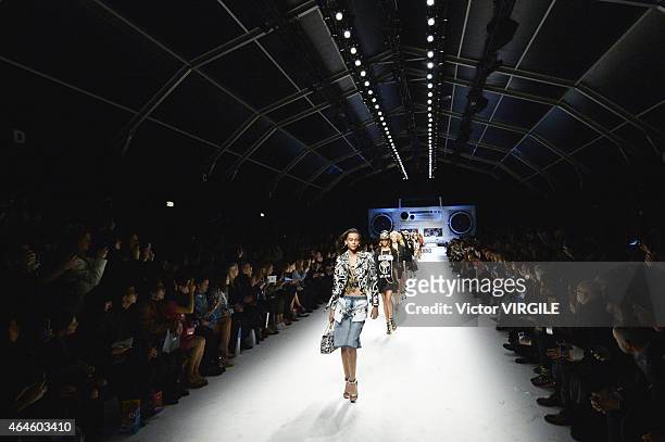 Model walks the runway at the Moschino show during the Milan Fashion Week Autumn/Winter 2015 on February 26, 2015 in Milan, Italy.