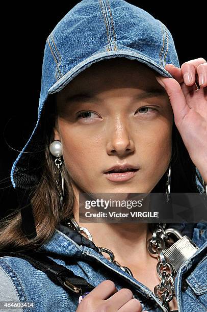 Yumi Lambert walks the runway at the Moschino show during the Milan Fashion Week Autumn/Winter 2015 on February 26, 2015 in Milan, Italy.