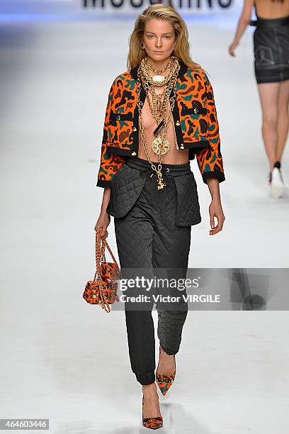 Model walks the runway at the Moschino show during the Milan Fashion Week Autumn/Winter 2015 on February 26, 2015 in Milan, Italy.