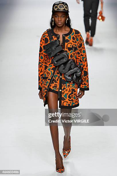 Model walks the runway at the Moschino show during the Milan Fashion Week Autumn/Winter 2015 on February 26, 2015 in Milan, Italy.