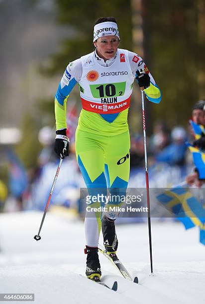Katja Visnar of Slovenia competes during the Women's 4 x 5km Cross-Country Relay during the FIS Nordic World Ski Championships at the Lugnet venue on...