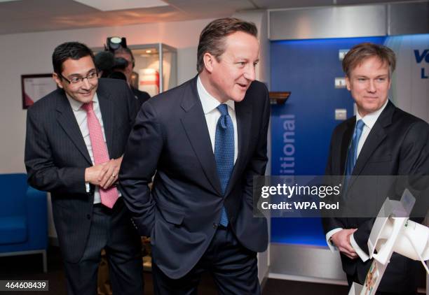 Prime Minister David Cameron with Chief Executive Ronnie George and Henry Smith, MP for Crawley during his visit to the headquarters of ventilation...