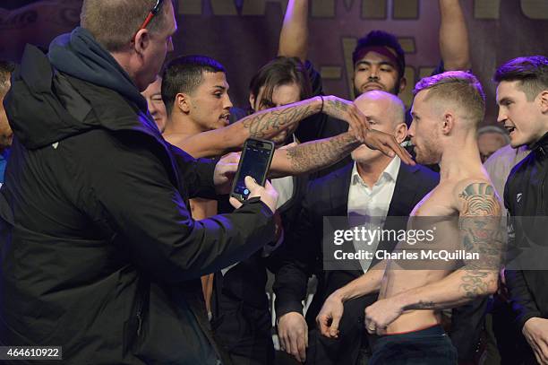 World Champion Carl Frampton is shoved by challenger Chris Avalos at the pre-fight weigh-in ahead of the IBF World Super Bantamweight title fight...