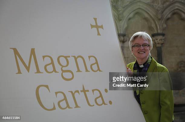 The Very Revd. June Osborne, Dean of Salisbury stands besided the new booth for viewing the copy of the Magna Carta that is preserved in Salisbury...