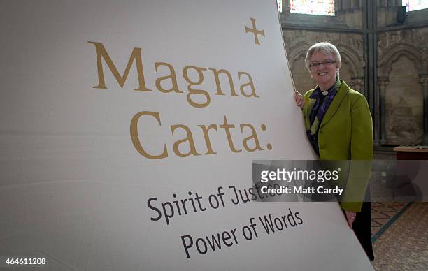 The Very Revd. June Osborne, Dean of Salisbury stands besided the new booth for viewing the copy of the Magna Carta that is preserved in Salisbury...