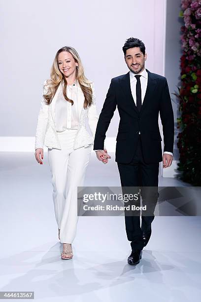 Tamara Ralph and Michael Russo walk the runway at the end of the Ralph & Russo show as part of Paris Fashion Week Haute Couture Spring/Summer 2014 on...