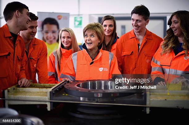 Scotlands First Minister Nicola Sturgeon marks hers first 100 days in office with a visit to Glaxo Smith Kline where she met with apprentices on...