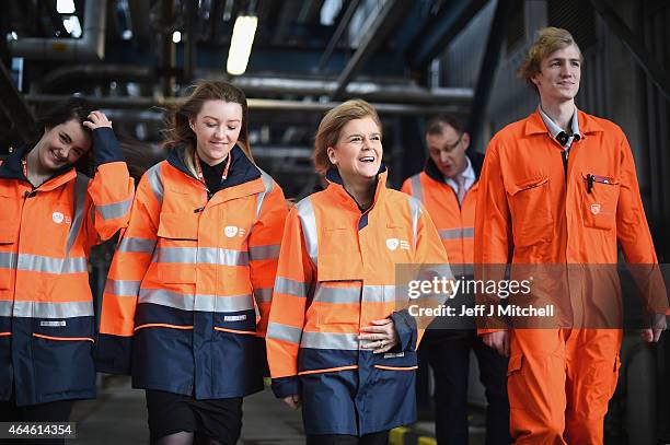 Scotlands First Minister Nicola Sturgeon marks hers first 100 days in office with a visit to Glaxo Smith Kline where she met with apprentices on...