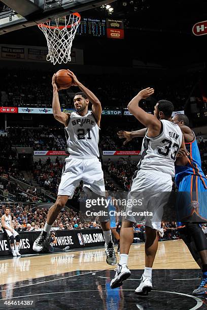 Tim Duncan of the San Antonio Spurs grabs the rebound against the Oklahoma City Thunder on January 22, 2014 at the AT&T Center in San Antonio, Texas....