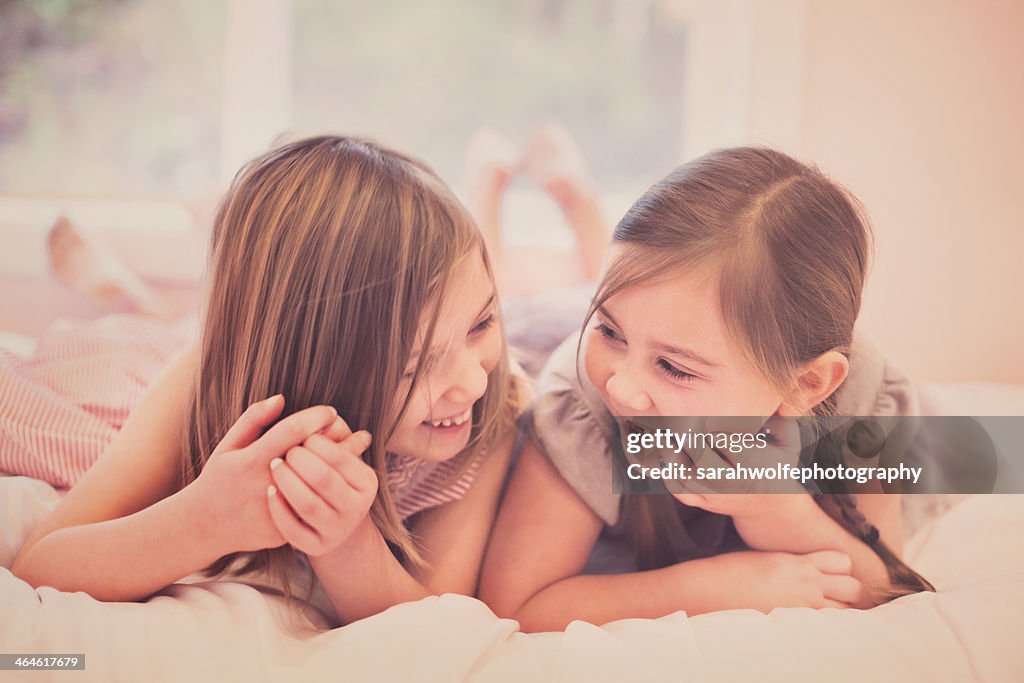 Sister's sharing a laugh