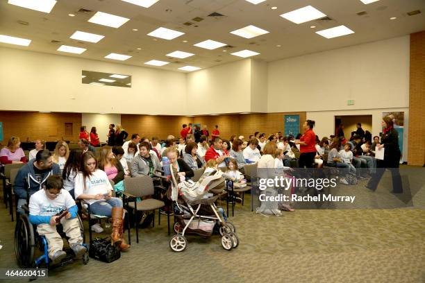 Patients arrive to be tested and fit for hearing aids at the Starkey Hearing Foundation Mission during GRAMMY Camp at University of Southern...