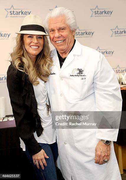 Tv personality Paige Hemmis and Starkey Founder and CEO William Austin attend the Starkey Hearing Foundation Mission during GRAMMY Camp at University...