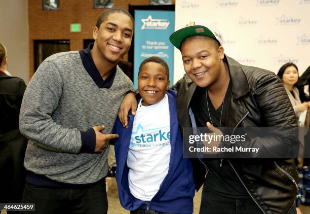 Actors Christopher Massey and Kyle Massey and patient Usaamah Edwards attend the Starkey Hearing Foundation Mission during GRAMMY Camp at University...