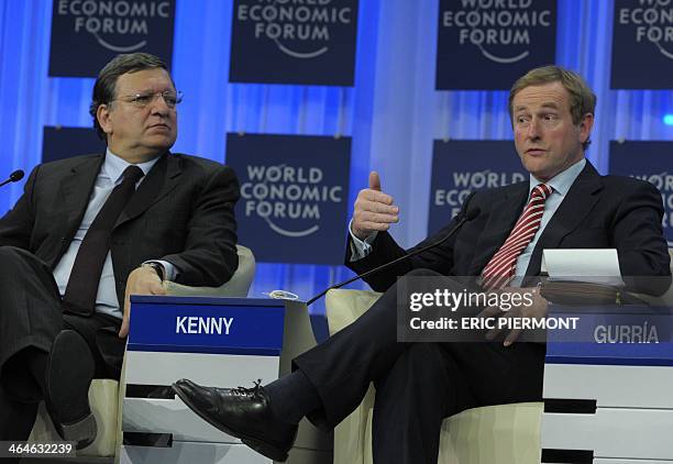 European Commission Jose Manuel Barroso listens to Irish Prime Minister Enda Kenny at the World Economic Forum in Davos on January 23, 2014. Some 40...