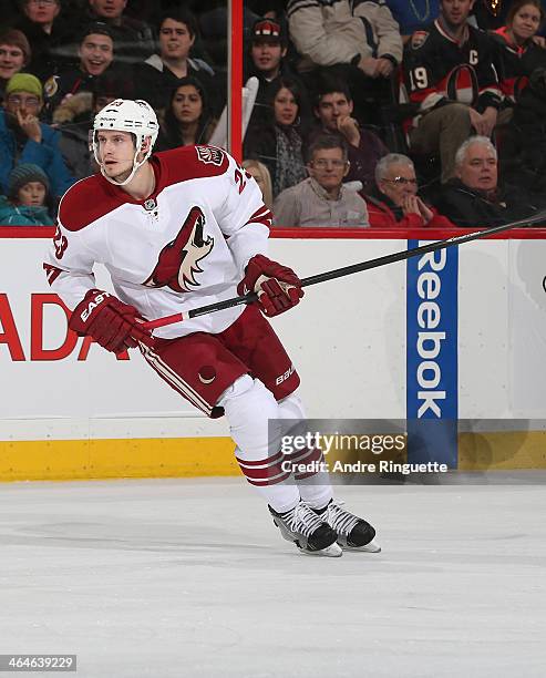 Oliver Ekman-Larsson of the Phoenix Coyotes skates against the Ottawa Senators at Canadian Tire Centre on December 21, 2013 in Ottawa, Ontario,...