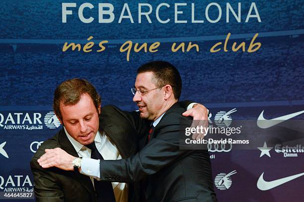 Vice-President Josep Maria Bartomeu hugs FCB President Sandro Rosell after the press conference announcing his resgination as FCB president on...