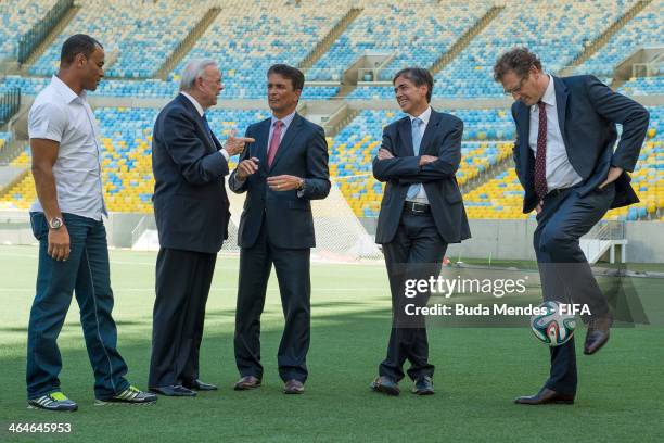Secretary General Jerome Valcke kicks the ball with Brazilian Deputy Sports Minister Luis Fernandes, LOC member Bebeto, President of LOC 2014 Jose...