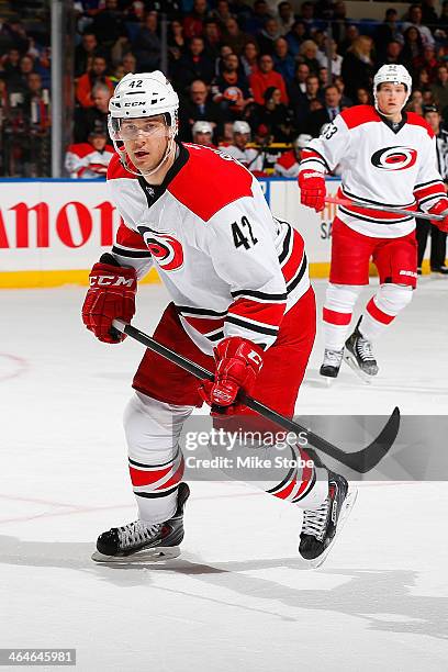 Brett Sutter of the Carolina Hurricanes skates against the New York Islanders at Nassau Veterans Memorial Coliseum on January 4, 2014 in Uniondale,...