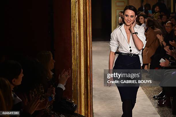 Italian fashion designer Alessandra Facchinetti acknowledges the audience after the show for Italian fashion house Tod's at the women Fall / Winter...