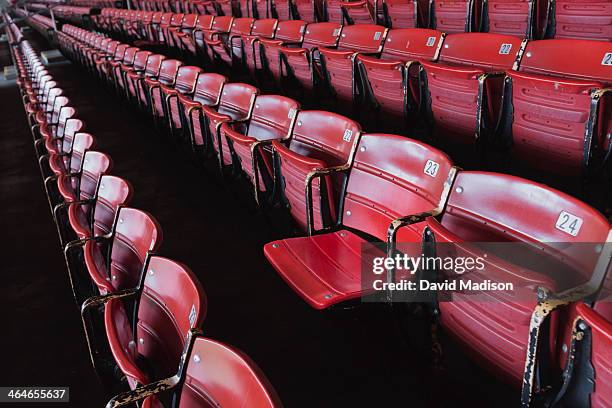 numbered stadium seats - tribüne stock-fotos und bilder