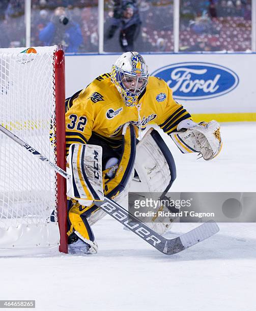 Rasmus Tirronen of the Merrimack College Warriors tends goal against the Providence College Friars during NCAA hockey action in the "Citi Frozen...