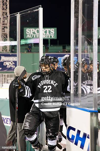 Brandon Tanev of the Providence College Friars exits the ice surface before NCAA hockey action against the Merrimack College Warriors in the "Citi...