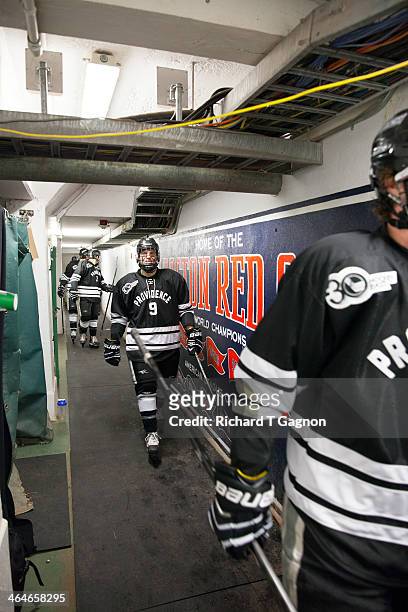 Trevor Mingoia of the Providence College Friars walks through the tunnel that leads from the Friars locker to the Boston Red Sox dugout before NCAA...
